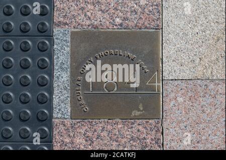Ground Plaque at Circular Quay Shoreline 1844 on a sunny winter afternoon Stock Photo