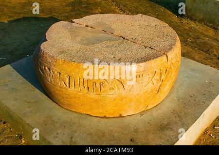 Egypt, Nile Delta, Tanis, artifacts displayed near the mission house : Part of a column, with hieroglyphs, including the sign of a horse. Stock Photo