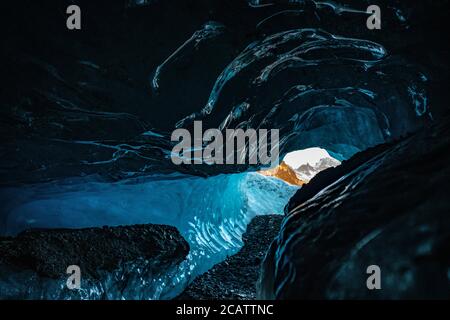 A blue ice cave in Skaftafell National Park, in Iceland. Stock Photo