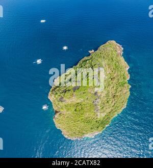 Four images were combined for this panorama aerial view looking straight down on the island of Gato, Bohol Sea, Philippines, Southeast Asia. The small Stock Photo