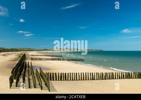 Mussel poles on the beach of Wissant on the Opal Coast in France Stock Photo