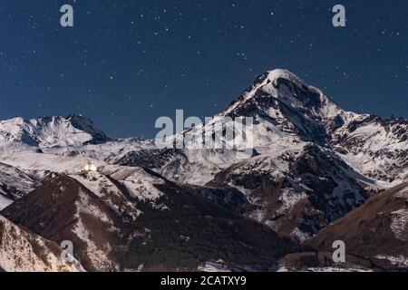 Night view of mountain Kazbegi, in Georgia. Stock Photo