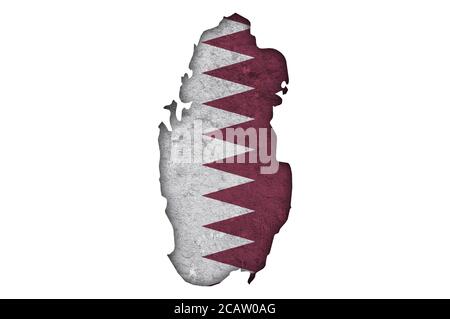 Map and flag of Qatar on weathered concrete Stock Photo