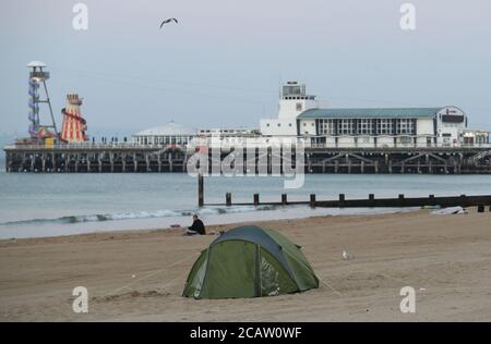 Tents pitched up on Bournemouth beach in Dorset. Stock Photo