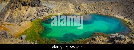 Panoramic view on one of the Emerald Lakes at the popular Tongariro Alpine Crossing hike in New Zealand Stock Photo
