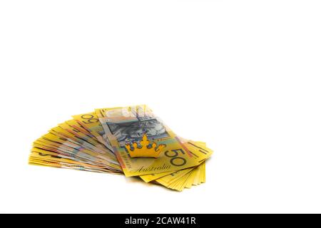 Stack of Australian 50 dollars banknotes with golden crown isolated ...