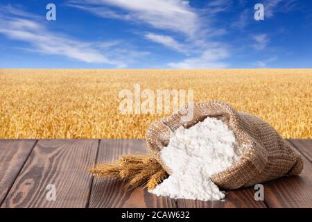 wheat flour in sack Stock Photo