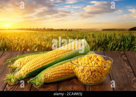 corn cobs and canned seeds in glass bowl Stock Photo
