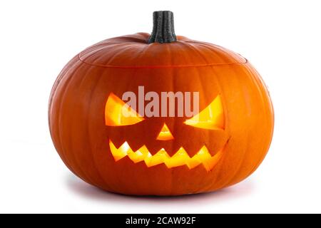 Glowing angry Halloween Pumpkin isolated on white background Stock Photo