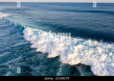 Aerial view of giant ocean waves crashing and foaming Stock Photo