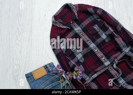 Checkered shirt and jeans. Fashionable concept Stock Photo