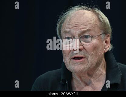 Neuhardenberg, Germany. 07th Aug, 2020. Klaus Maria Brandauer, Austrian actor and director, takes photographs during a reading rehearsal before his performance on the stage of the Stiftung Schloss Neuhardenberg. Credit: Patrick Pleul/dpa-Zentralbild/ZB/dpa/Alamy Live News Stock Photo