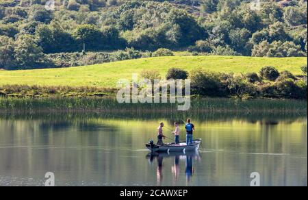 Ballingeary, Cork, Ireland. 09th August, 2020. On a hot summers day three men fish  for pike on Lough Aulla near Ballingeary, Co. Cork, Ireland. - Credit; David Creedon / Alamy Live News Stock Photo