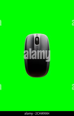 computer mouse isolated on the green background. Stock Photo