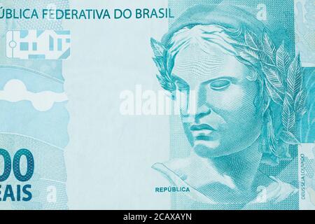 Republic's Effigy portrayed as a bust on Brazilian money. Super macro closeup on one hundred bill. Stock Photo