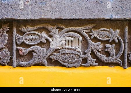 Fruits in the Garden of Eden, old stone relief. Stock Photo