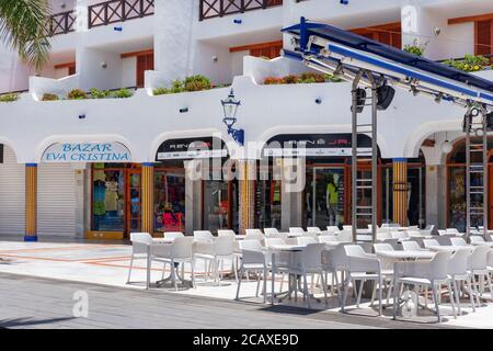 Empty streets and closed restaurants, shops and venues in once a very popular resort affected by lockdown caused by coronavirus epidemic, Las Americas Stock Photo