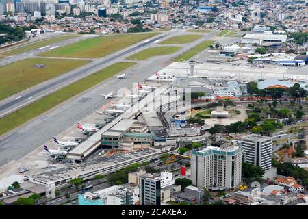 Aerial overview of Congonhas Airport passengers terminal and runways. Central airport of Sao Paulo, Brazil used for domestic flights. Stock Photo