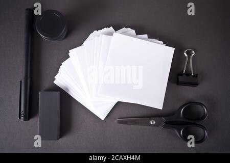 A set of office or shool supplies and accessories in a white black style. Top view. Stock Photo