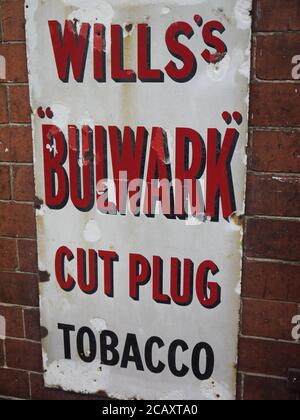 Close-up of a Vintage Wall Sign for Tobacco Stock Photo