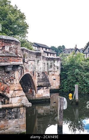 The historic Bishops bridge over the River Wensum in the city of Norwich Stock Photo