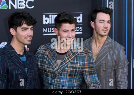 LAS VEGAS - MAY 1:  Joe Jonas, Nick Jonas, Kevin Jonas, Jonas Brothers at the 2019 Billboard Music Awards at MGM Grand Garden Arena on May 1, 2019 in Las Vegas, NV Stock Photo