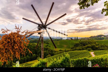 Styrian Tuscany like Vineyard with windmill, Styria, Austria Stock Photo