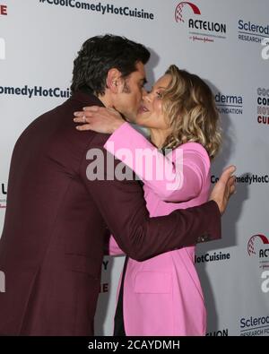 LOS ANGELES - APR 25:  John Stamos, Candace Cameron Bure at the Cool Comedy, Hot Cuisine 2019 at the Beverly Wilshire Hotel on April 25, 2019 in Beverly Hills, CA Stock Photo