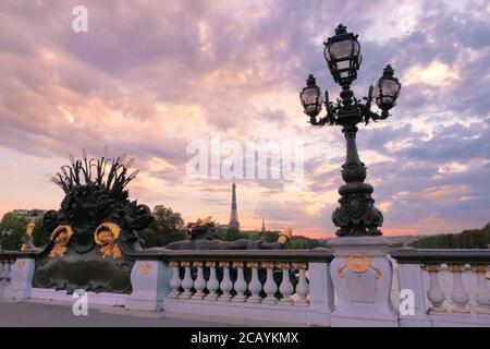 Paris, France. August 08. 2020. Sunset on the famous Alexander 3 Bridge. Historic retro-style lampposts. Very touristy place. Stock Photo