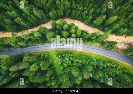 Aerial view of mountain road by the river in Norway. Scandinavian ...