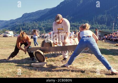 Jill and Jill Double Buck Sawing Competition Event, Loggers Jubilee celebration Morton, Washington USA Stock Photo