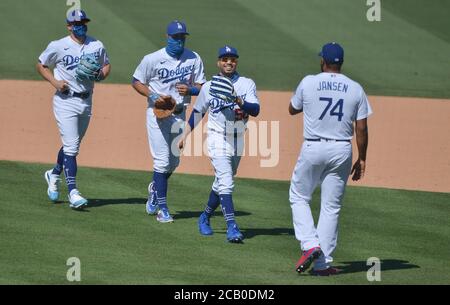 Los Angeles, United States. 09th Aug, 2020. Los Angeles Dodgers' Mookie Betts (50) celebrates with closing pitcher Kenley Jansen after the Dodgers defeated the Giants 6-2t at Dodger Stadium in Los Angeles on Sunday, August 9, 2020. Photo by Jim Ruymen/UPI Credit: UPI/Alamy Live News Stock Photo