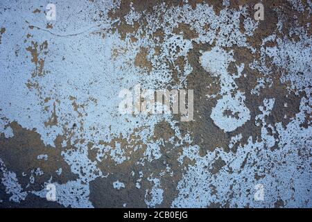 Abstract blue background texture with concrete flecks and grey concrete. Stock Photo