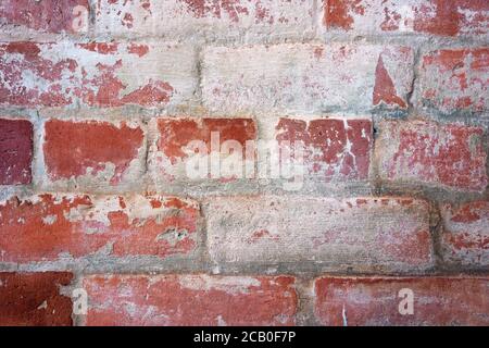 Red and white brick wall background with vintage bricks, mortar and abstract patterns. Stock Photo