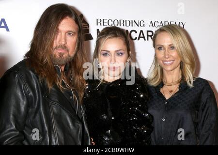 LOS ANGELES - FEB 8:  Billy Ray Cyrus, Miley Cyrus, Tish Cyrus at the MusiCares Person of the Year Gala at the LA Convention Center on February 8, 2019 in Los Angeles, CA Stock Photo