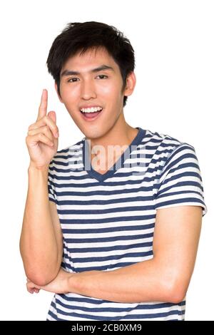 Studio shot of young happy Asian man having an idea isolated against white background Stock Photo