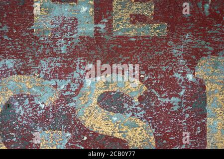 Red texture background wall with vintage letter typography design and abstract patterns. Stock Photo