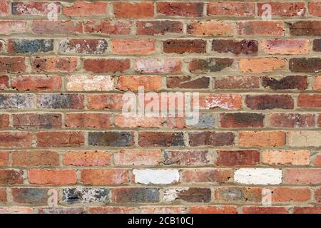 Old brick wall texture background showing vintage bricks, mortar and abstract patterns. Stock Photo
