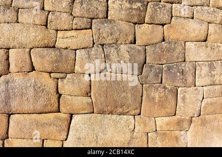 Traditional Inca Wall and stonework in the lost city of Machu Picchu, Cusco, Peru. Stock Photo