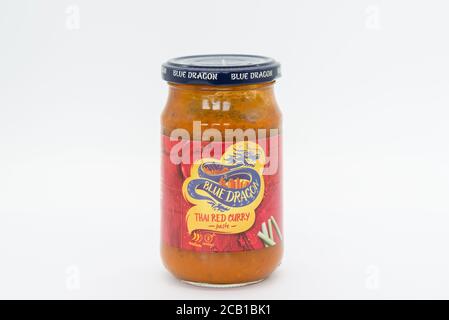 Irvine, Scotland, UK - August 08, 2020: Blue Dragon branded Thai Red Curry Paste in recyclable glass jar. Stock Photo