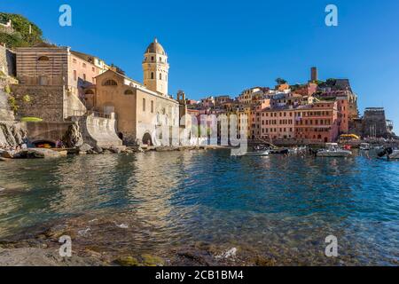 Wonderful bottom view of the famous Cinque Terre seaside village of Vernazza, Liguria, Italy, on a sunny summer day Stock Photo