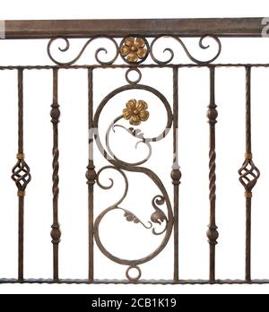 Detail of vintage wrought iron fence. Decorative forged banisters. Fence in retro style. Isolated on white background Stock Photo