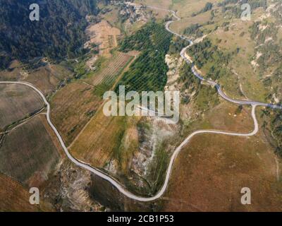 Birds Eye view of a very curvy road section at countryside Stock Photo