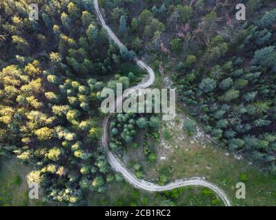 Birds Eye view of a very curvy road section at countryside Stock Photo