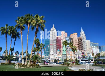 LAS VEGAS, USA - MARCH 19, 2018 : New York New York hotel on Las Vegas boulevard (The Strip). Palm trees square. Stock Photo