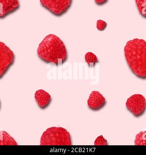 seamless raspberry pattern on pink background. Flat lay. Top view. Food background with summer berries. Creative minimalism Stock Photo