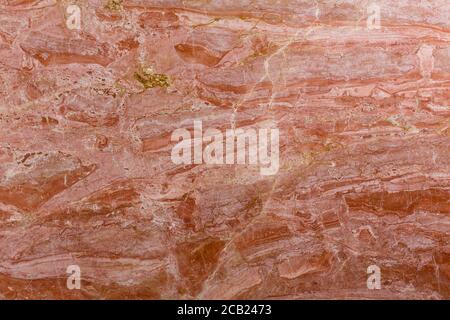 Red marble patterned texture background close-up. Stock Photo