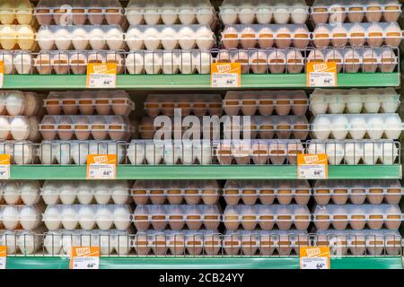 Krasnoyarsk, Russia, August 10, 2020: chicken eggs in cells on a shop window. Stock Photo