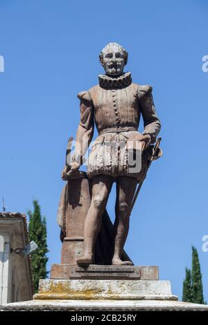 Valladolid, Spain - July 18th, 2020: Miguel de Cervantes writer monument, made Nicolas Fernandez de la Oliva, 1877 at Plaza de la Universidad, Vallado