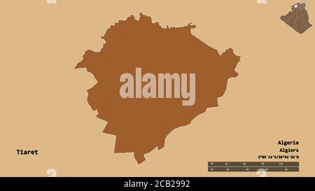 Shape of Tiaret, province of Algeria, with its capital isolated on solid background. Distance scale, region preview and labels. Composition of pattern Stock Photo